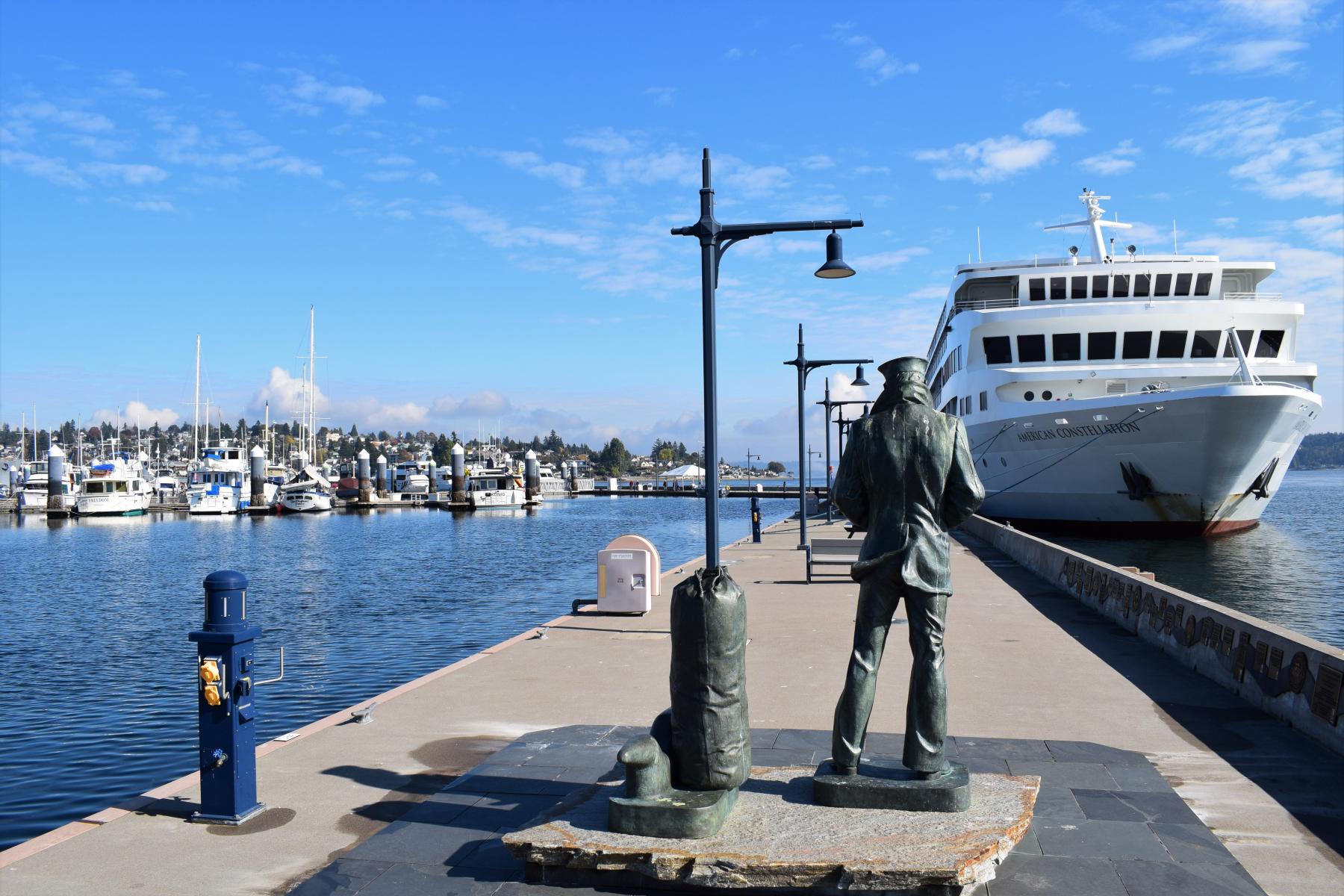 Lone Sailor Statue and Cruise Ship